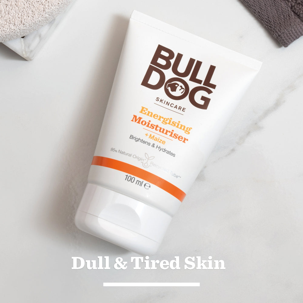 A can of Energising Spray Deodorant Bundle for long-lasting freshness sits on a light surface. Use with our Face Wash for extra benefits, featuring 8% natural origin ingredients in a 100 ml pack.