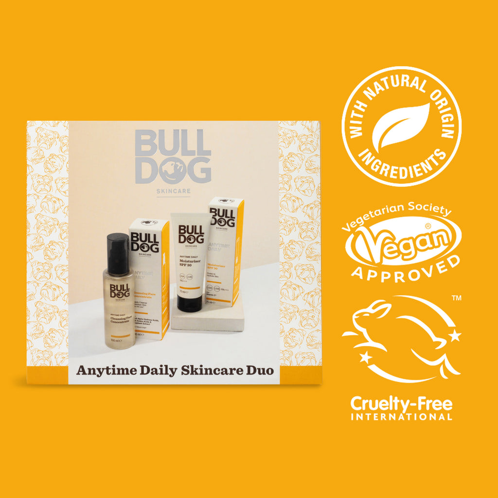 The Advanced Anytime Daily Duo, ideal for your daily routine, includes two products displayed on an orange background with logos for natural ingredients, vegan approval, and cruelty-free certification.